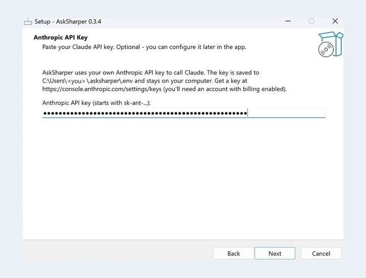 The AskSharper installer's "Anthropic API Key" step: it explains that AskSharper uses your own Anthropic API key to call Claude and that the key is saved on your computer, with a field where the key has been pasted and Back, Next, and Cancel buttons.